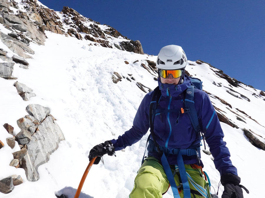 Niko Kampelmühler, LANK Technology co-founder, climbing a snowy ridge